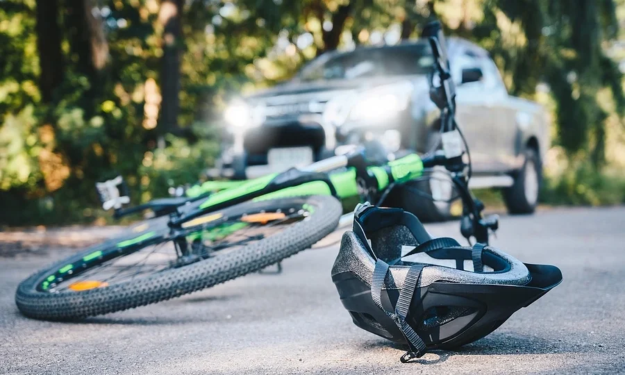 Bicycle and helmet fallen over