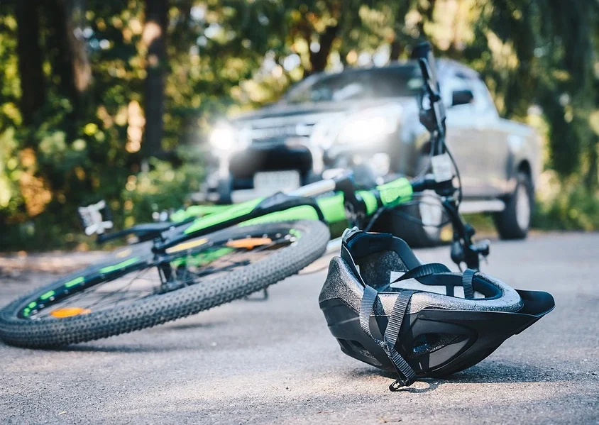 Bicycle and helmet fallen over