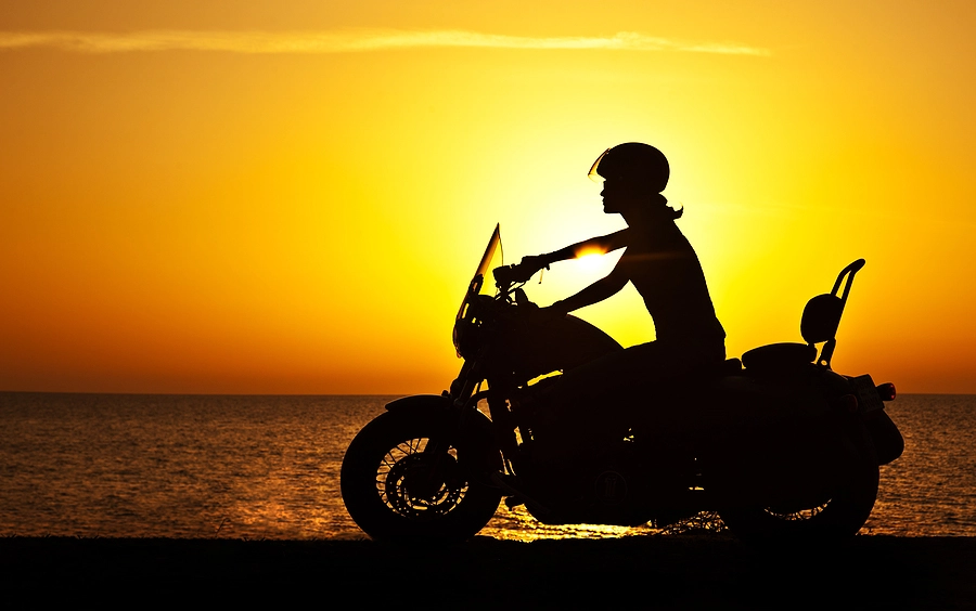 Biker riding during sunset